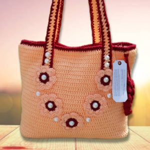 women peach crochet floral handbag