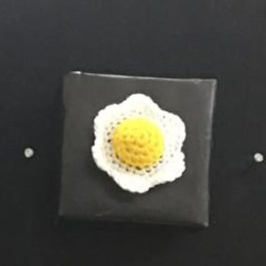 crochet egg wall hanging